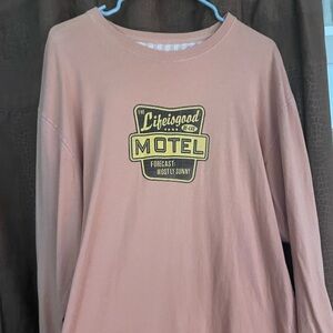 Men’s long sleeve t shirt . Faded and soft.